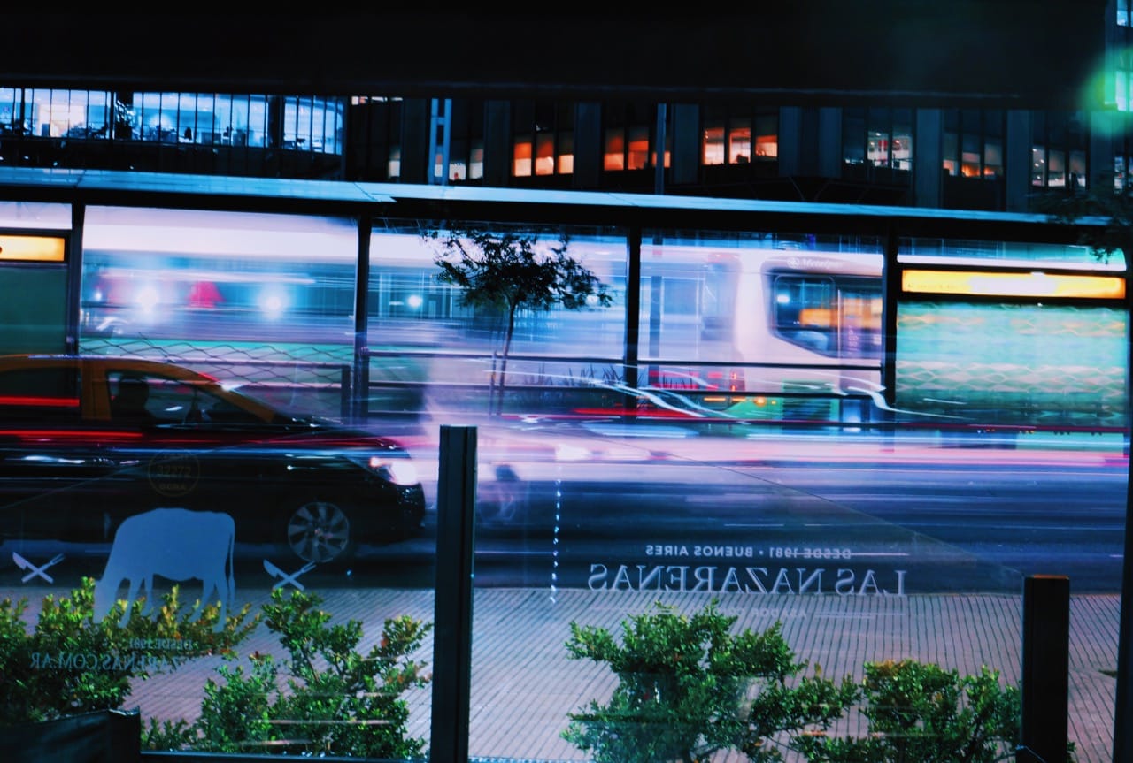 city lights of cars outside winodw